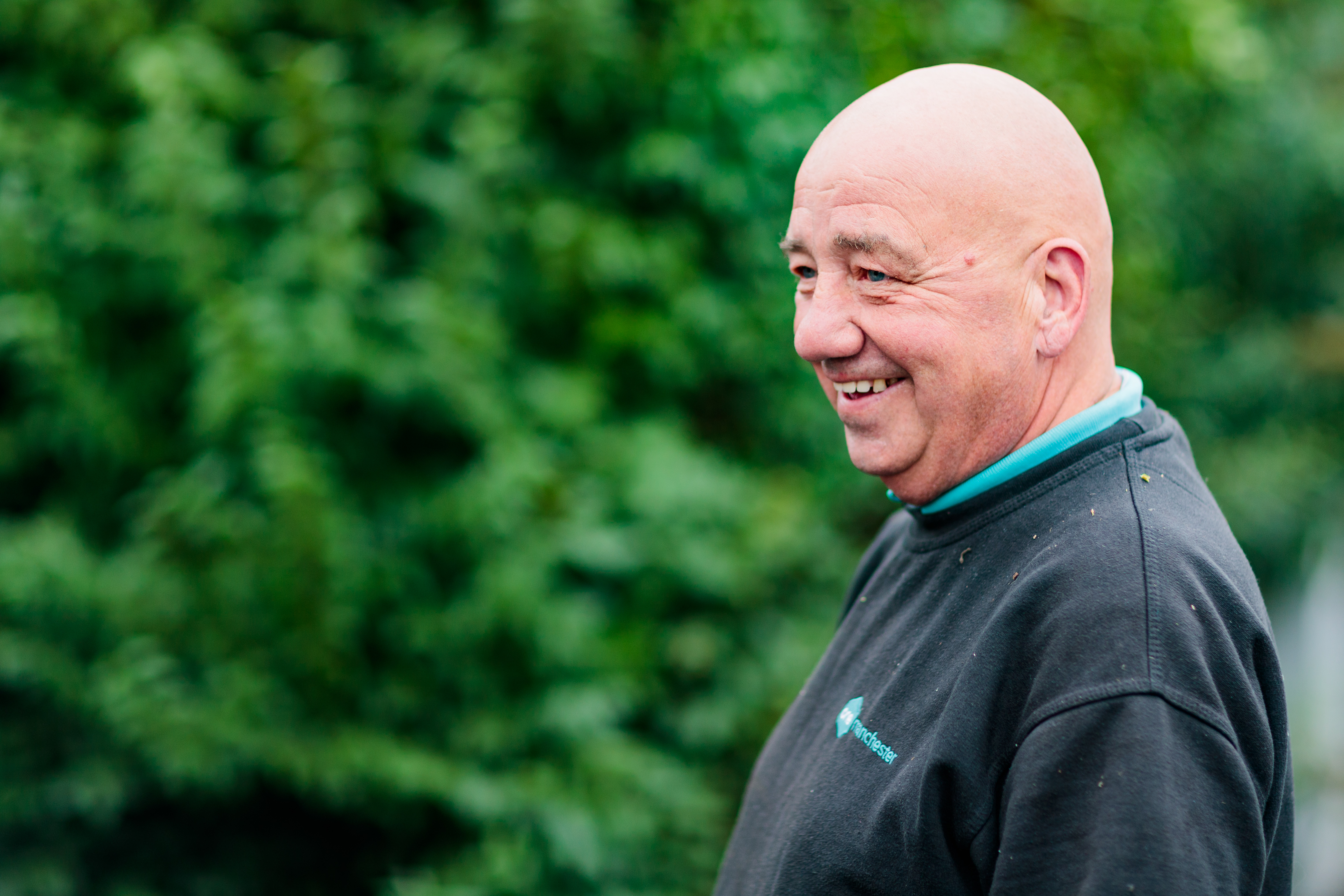 Man smiling outside