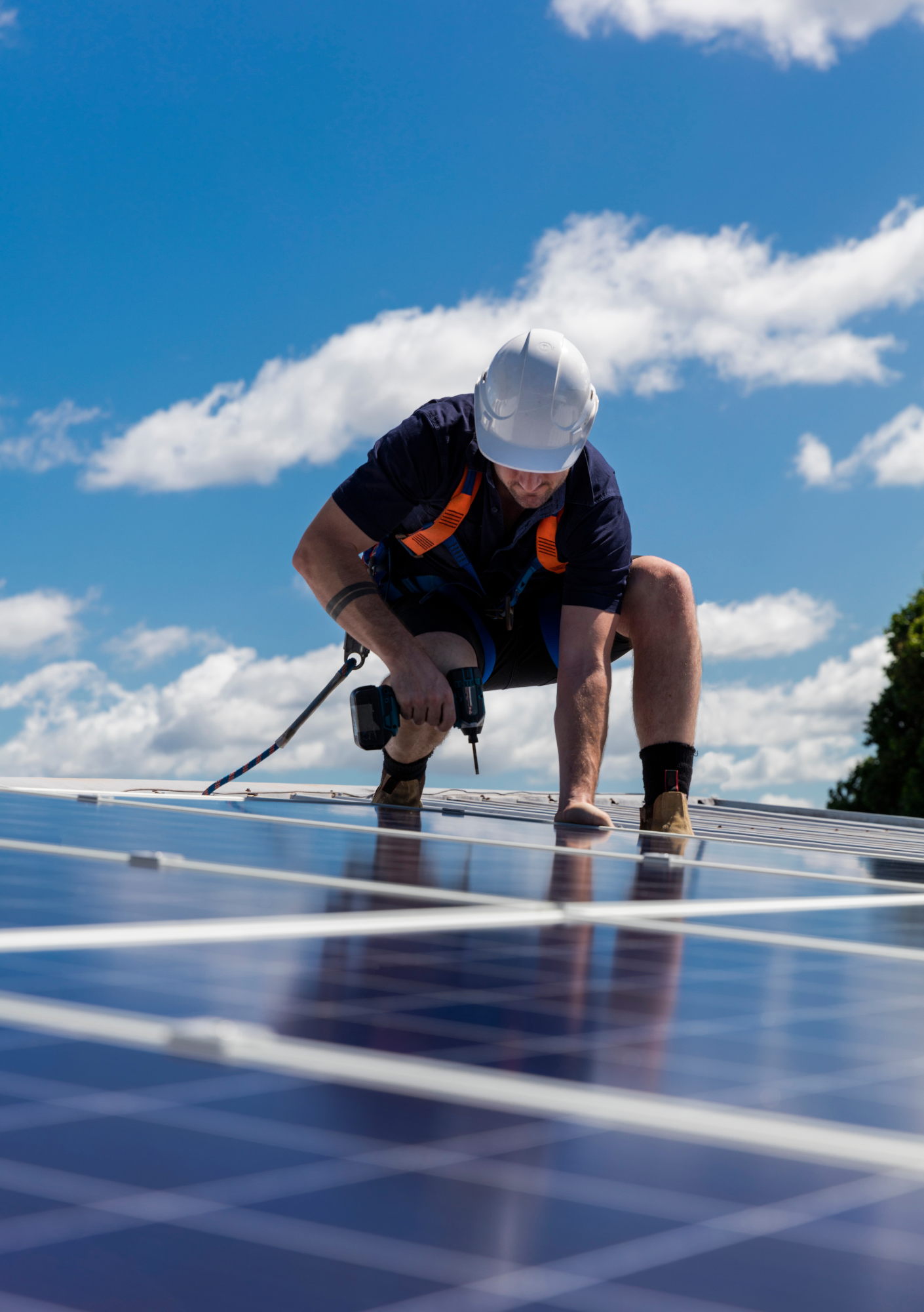 Person installing solar panels