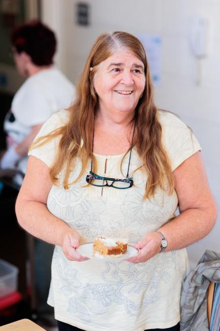 Woman stood up smiling