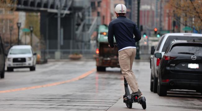 Man riding a scooter