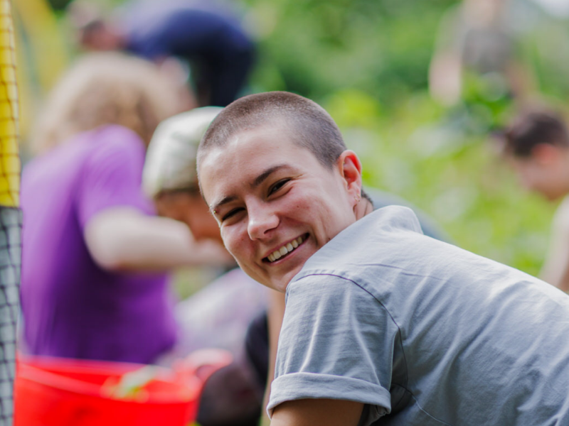 Customer gardening and smiling