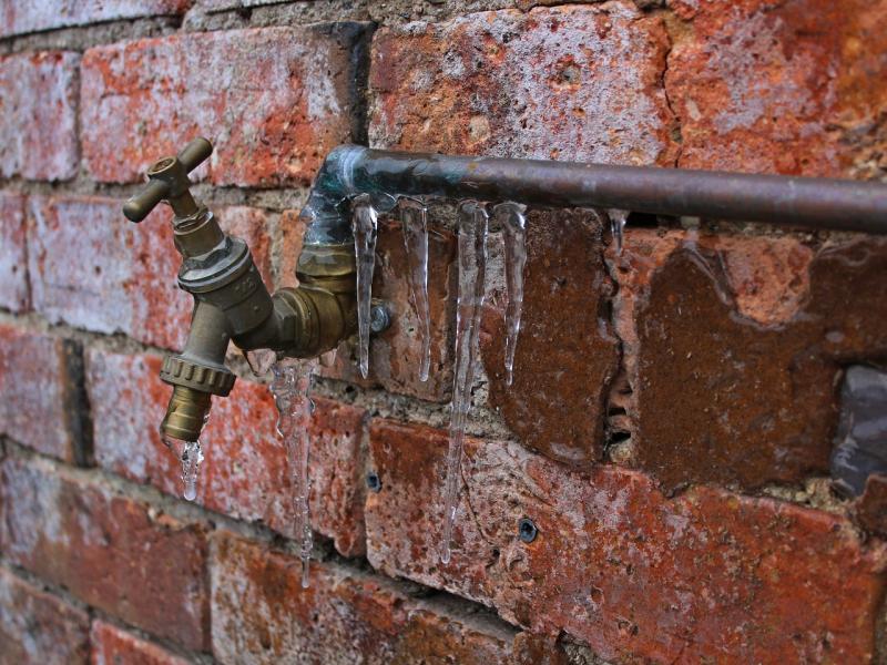 An image of a frozen pipe and tap