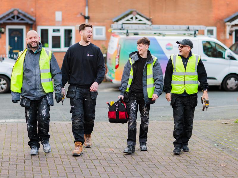 One Manchester colleagues walking towards a repair they're about to complete.