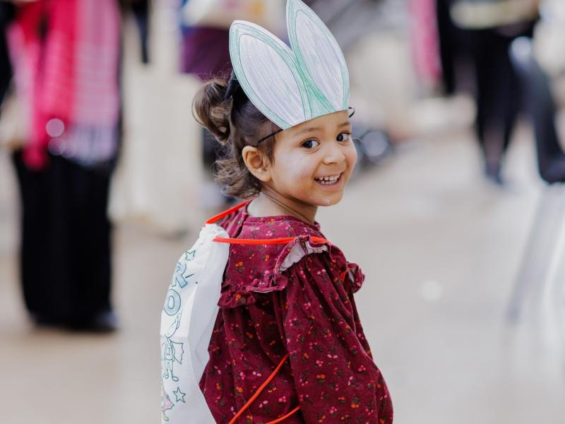 Child at a community fun event