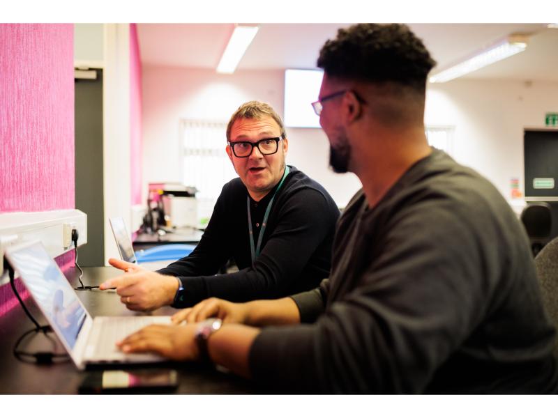 Two people in conversation