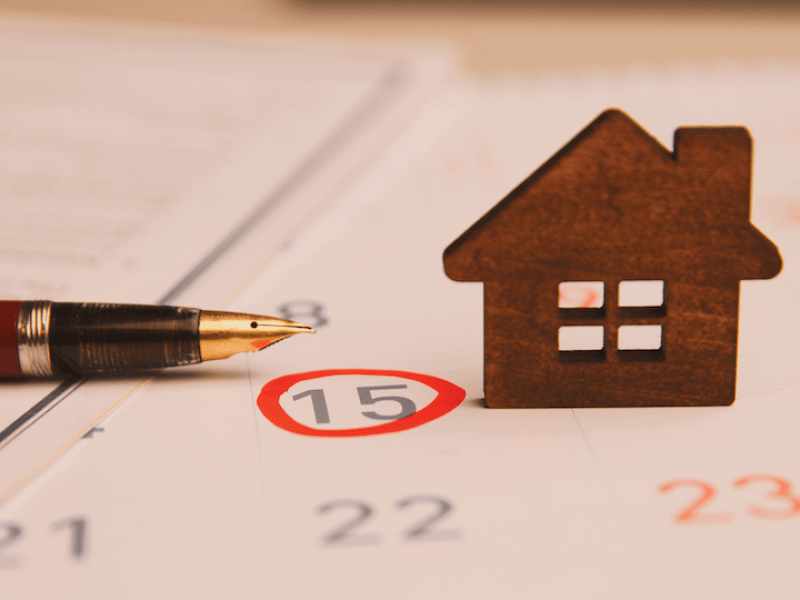A calendar with a house next to the date indicating a significant date