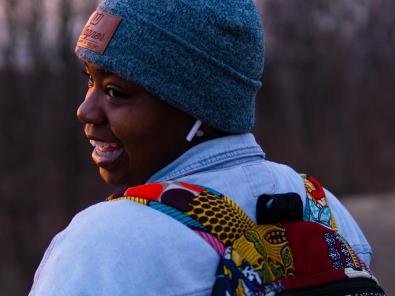 Young person wearing a beanie