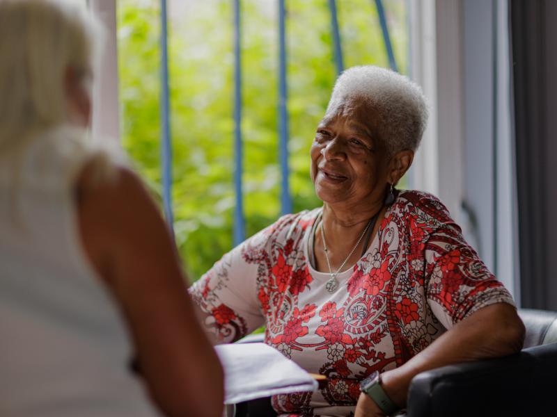 customer speaking to colleague at a neighbourhood hub