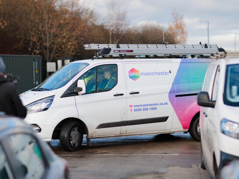 a parked One Manchester van