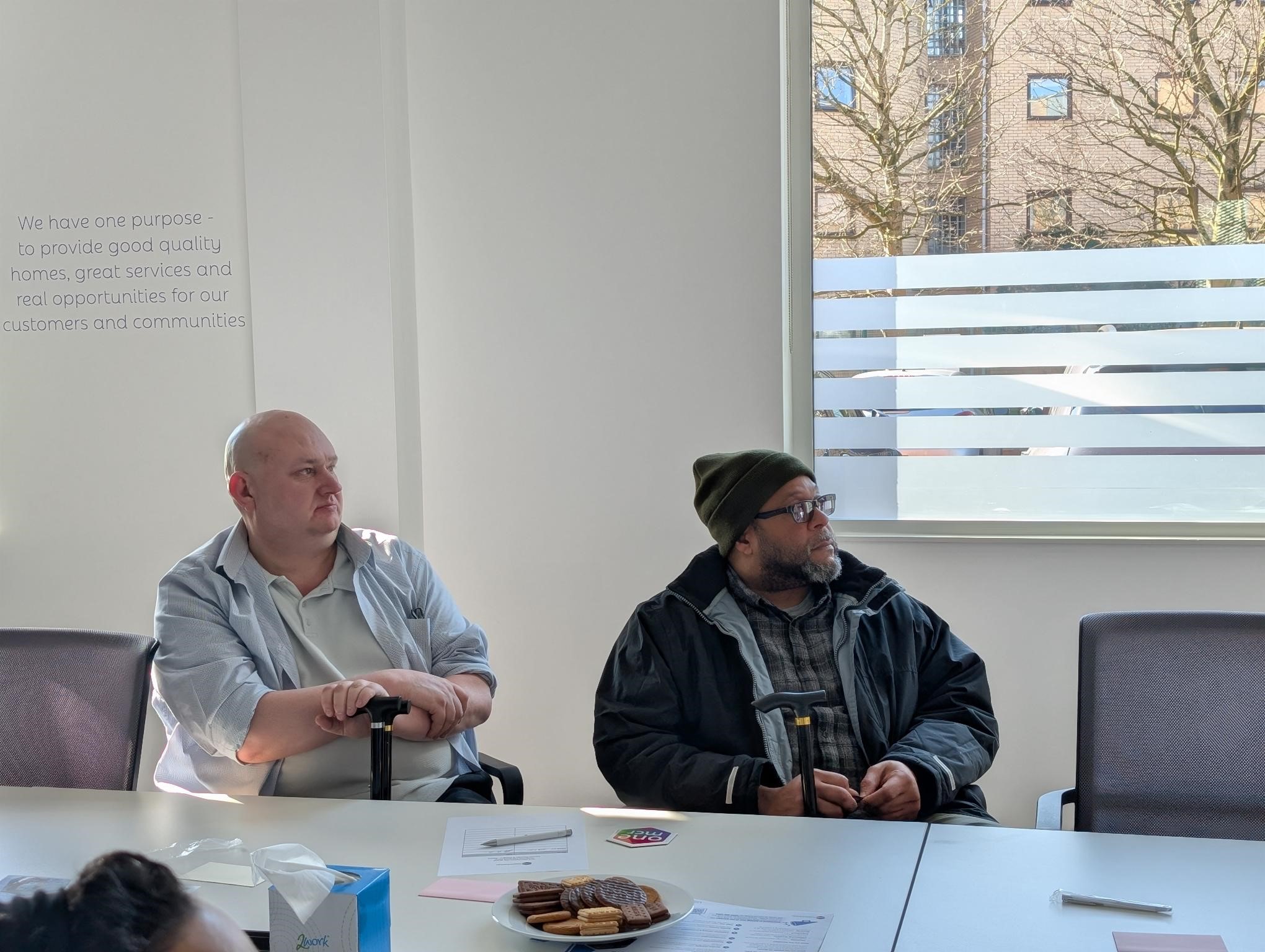 Two customers at a panel session